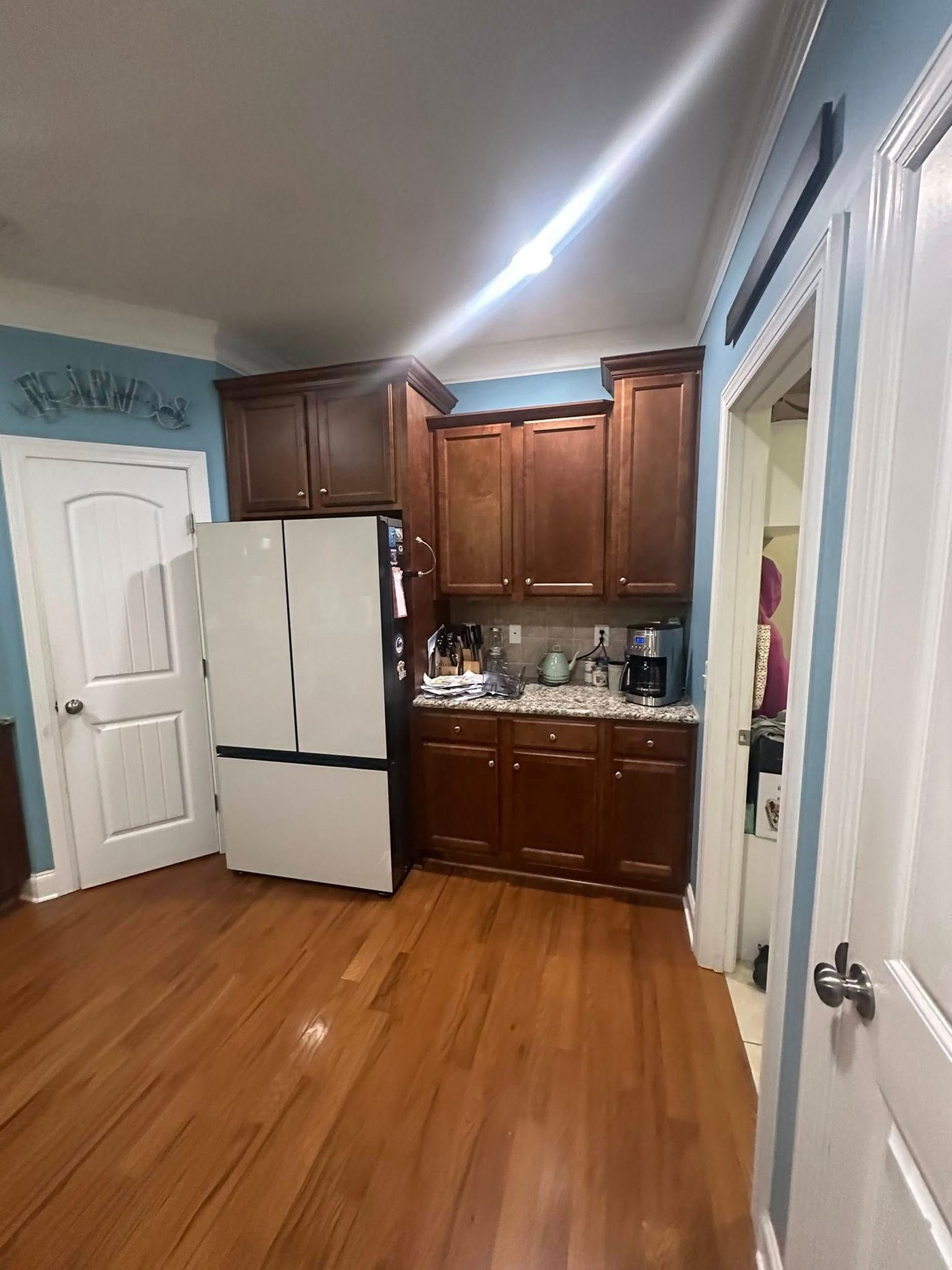 Dark wood cabinets before the remodel