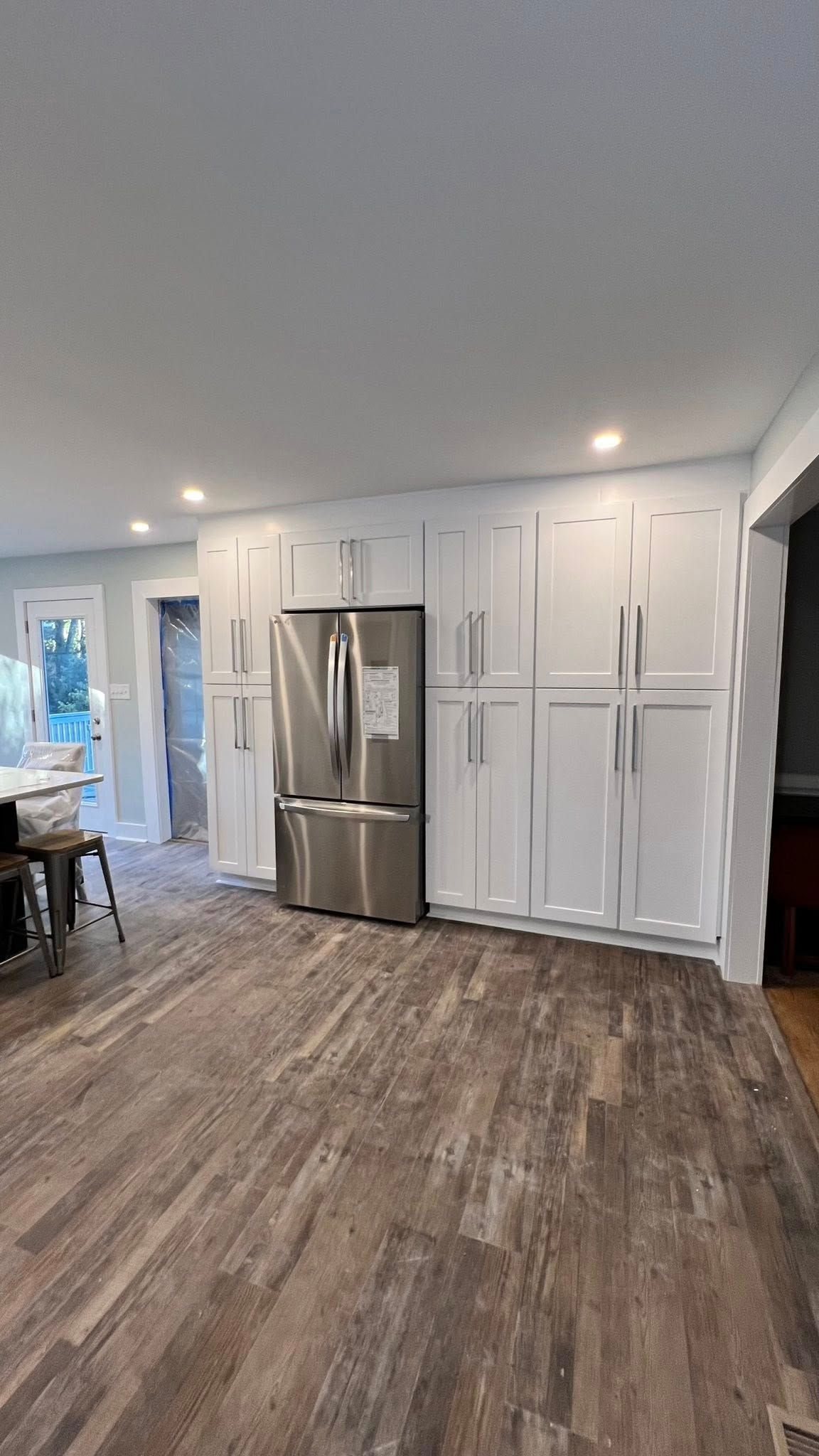 Floor-to-ceiling pantry wall cabinets